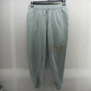 Nike Sportswear Club Fleece Joggers Nike Signature Gold Text Womens MId Rise Med